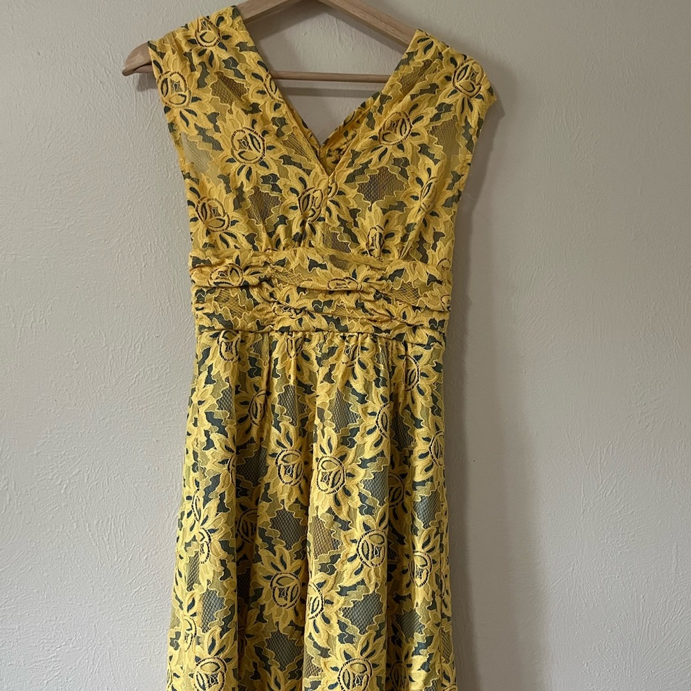 Yellow lace with blue beneath